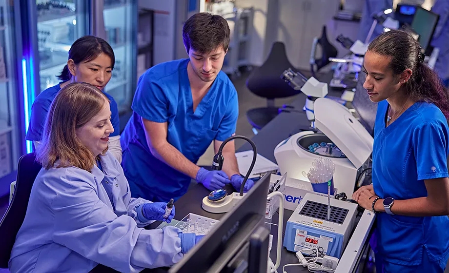Lab residency students working together