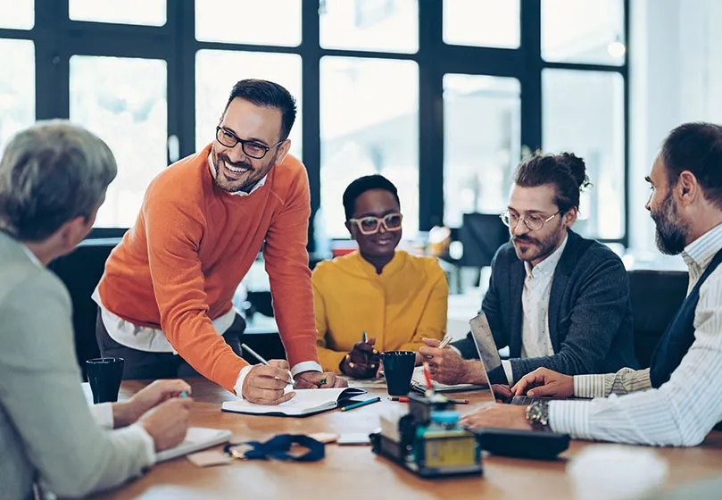 People happy in a work meeting