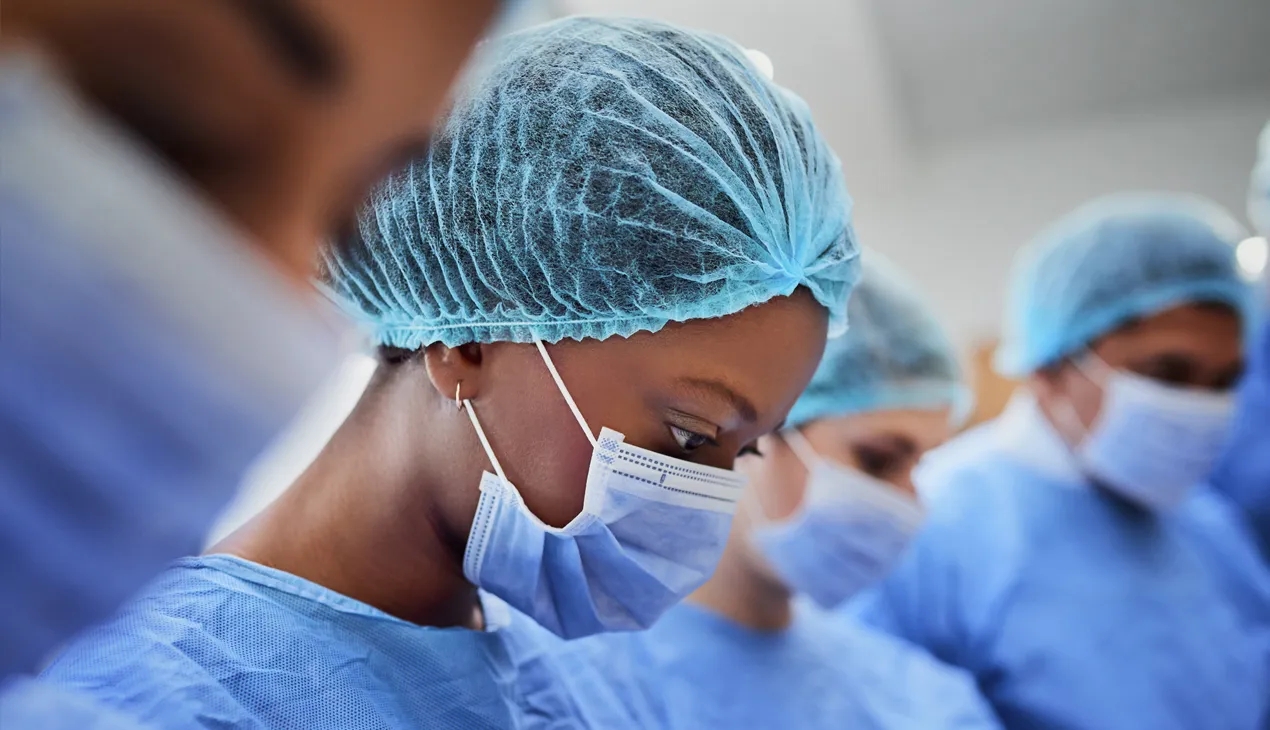 doctor with scrubs and face mask on