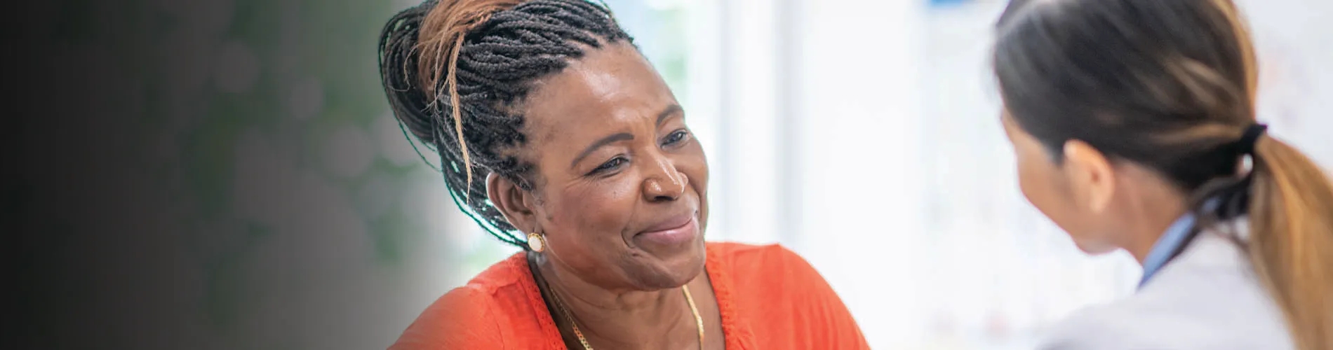 patient smiling at physician